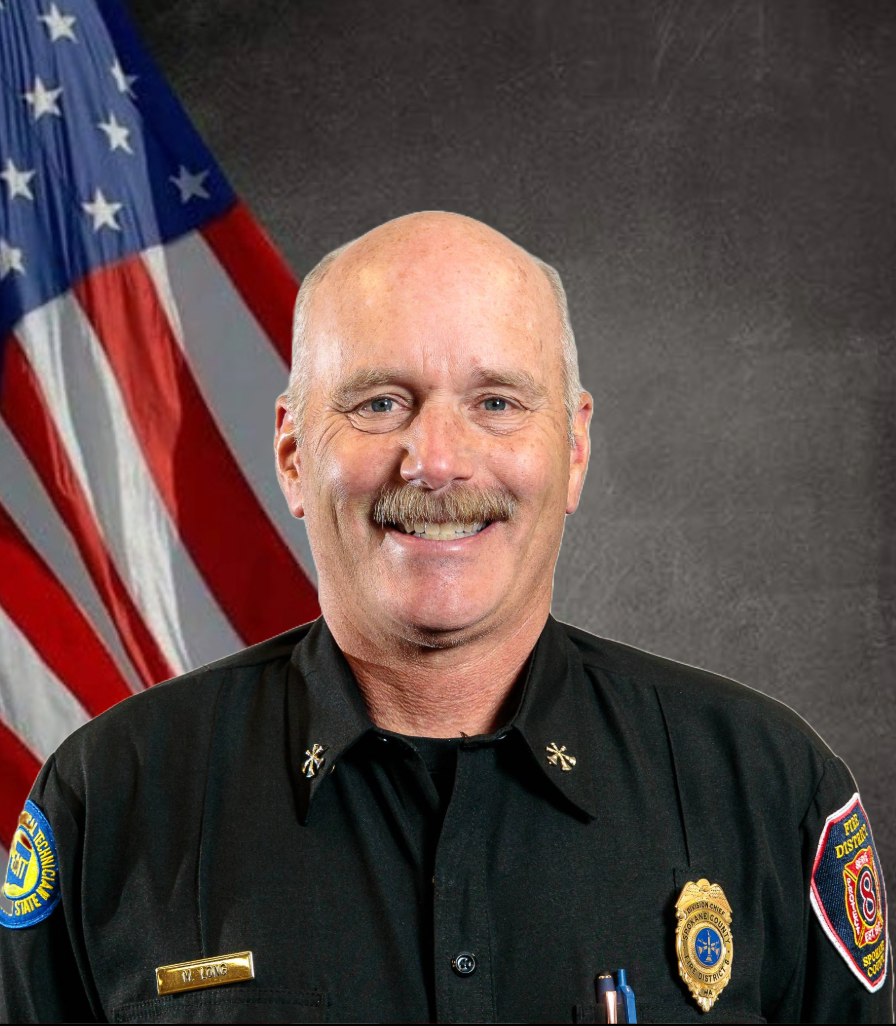 Longcropped Marty Long, Division Chief